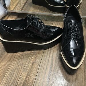 Black platform patent leather oxfords